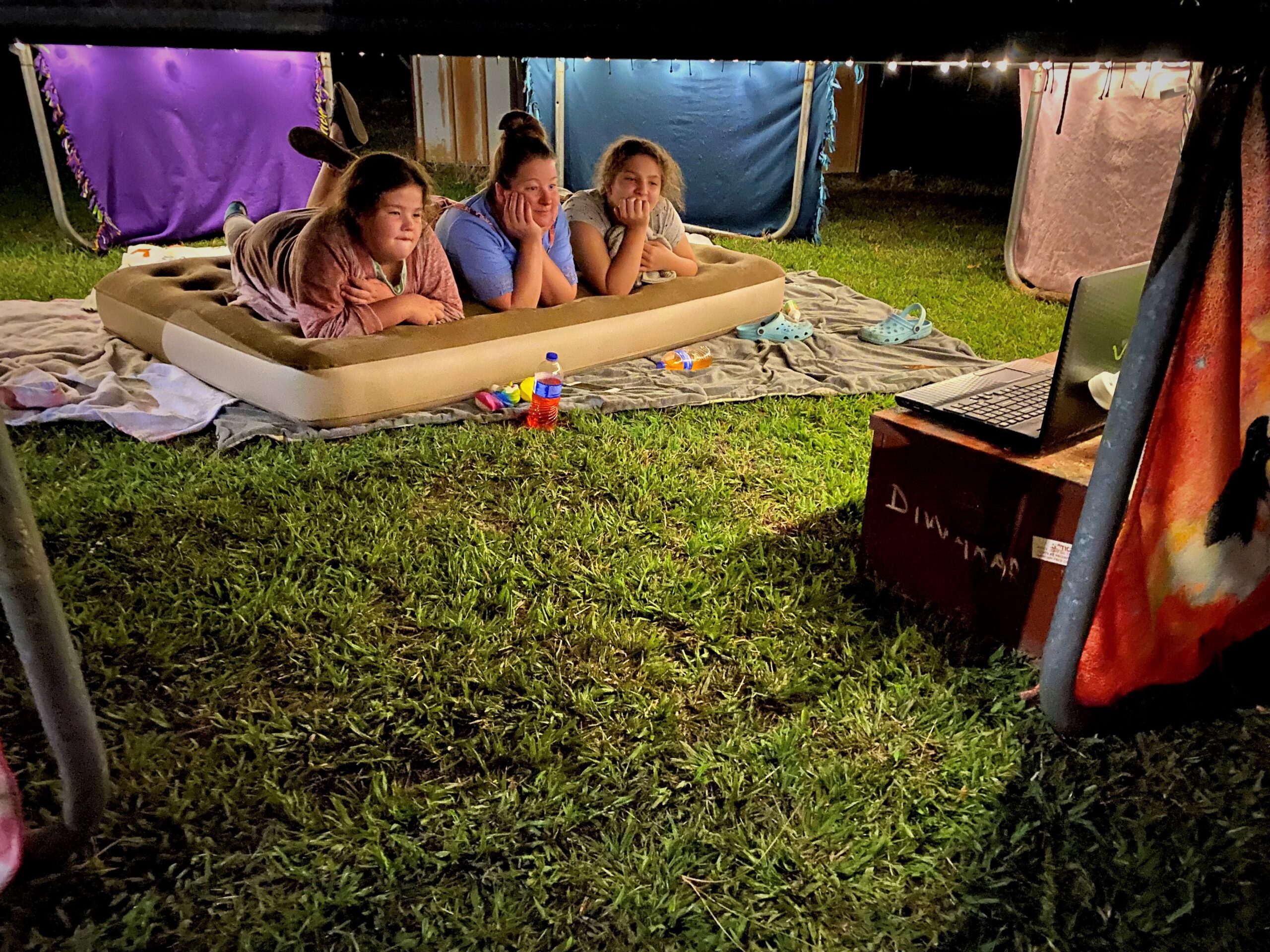 Family time under the trampoline.